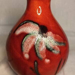 Manhattan Daisy Conical Bud Vase with varying burnt orange, greens, white and black