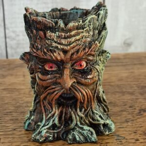 A backflow incense burner of the green man made out of resin