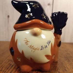 Wizard gonk oil burner. Colours are orange, gold, black and beige